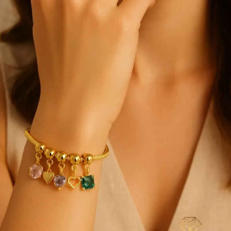 PULSEIRA COM BERLOQUES ZIRCÔNIA COLORIDAS E CORAÇÕES