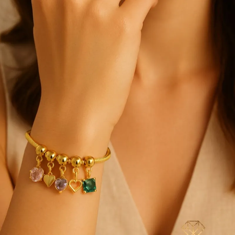 PULSEIRA COM BERLOQUES ZIRCÔNIA COLORIDAS E CORAÇÕES